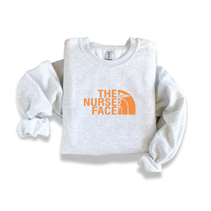 The Nurse Face Orange Crewneck Sweatshirt Unisex