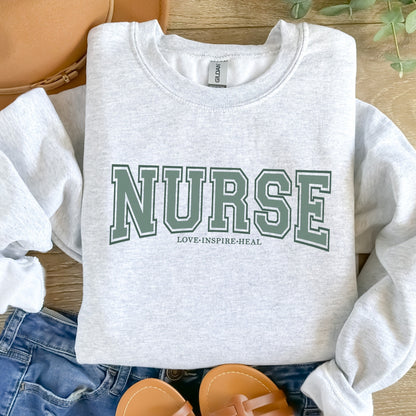 Nurse Love Inspire Heal Crewneck Sweatshirt Unisex
