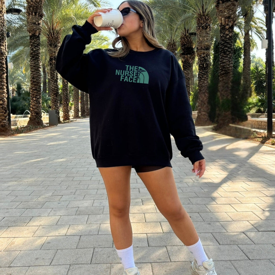 The Nurse Face Teal Crewneck Sweatshirt Unisex