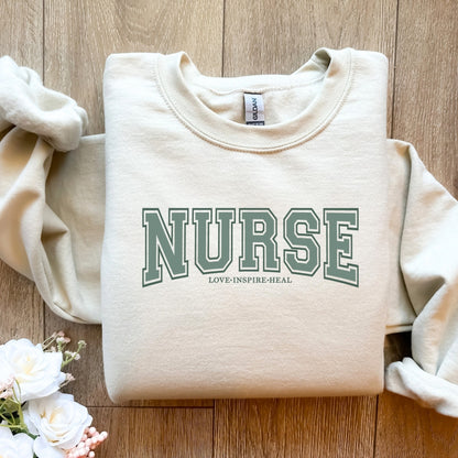 Nurse Love Inspire Heal Crewneck Sweatshirt Unisex